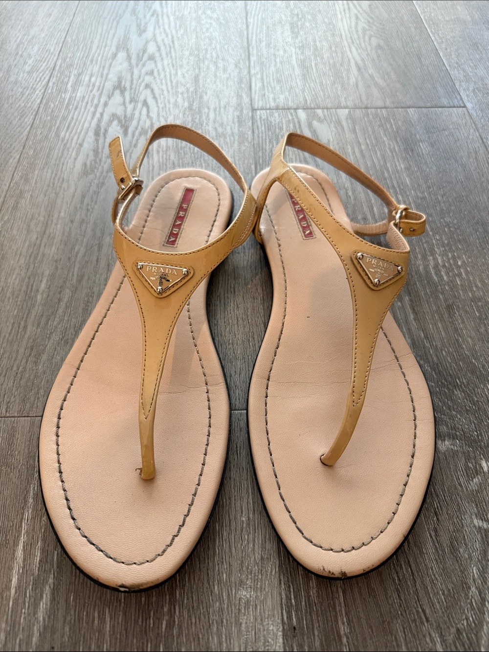 Prada Nude/Tan Leather T-Strap Sandals with Gold Logo